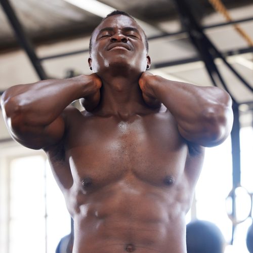 Fitness, neck pain and man with injury at gym for exercise, training and cardio on blurred backgrou.
